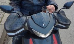 Çay içerek motosiklet kullanan sürücüye ceza